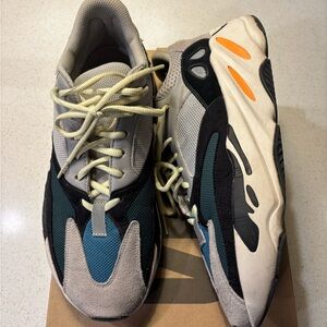 Yeezy Gray and Teal Athletic Shoes with Orange Highlights